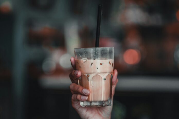 Photo by Julian Christian Anderson full filled liquid drinking glass